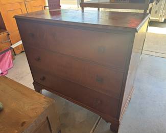 Antique tiger maple three drawer chest