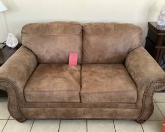 Ashley Brown brushed leather loveseat