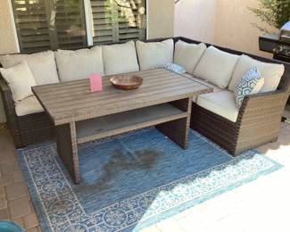 With her patio sectional and matching table
