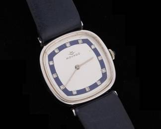 Lot 218: 14k Gold and Diamond Movado Ladies Wrist Watch
