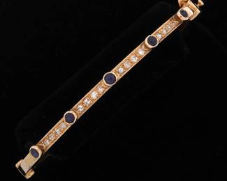 Lot 96: 14k Gold Diamond Sapphire Ruby Bangle Bracelet