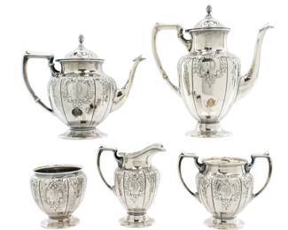 Lot 28a: M. Fred Hirsch Five Piece Hand Chased Sterling Silver Tea Service