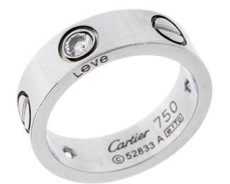 Lot 121: Cartier 18k White Gold and Diamonds Love Ring
