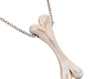 Lot 124: Elsa Peretti for Tiffany Sterling Dog Bone Pendant