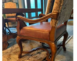 Chairs have leather seating with Chenille French fabric