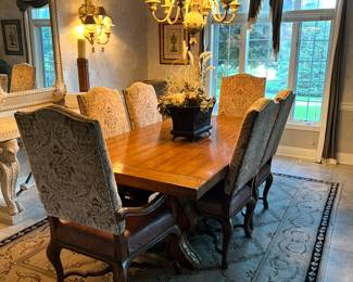 Designer table with six chairs, rug also for sale.