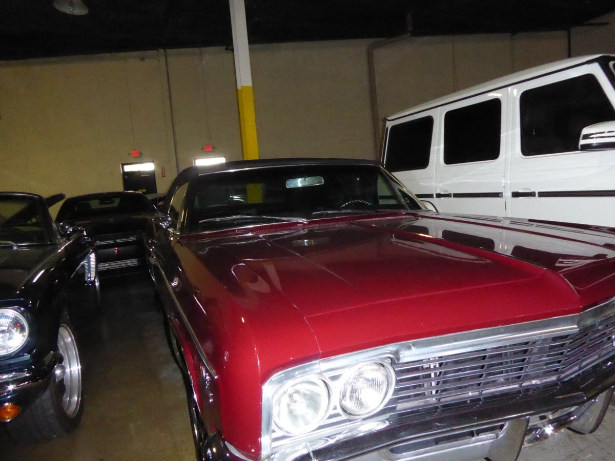 1966 Chevy Impala Convertible, SS Pro Touring, RestoMod, Numbers matching engine block, Rebuilt 398 Overdrive automatic, 3500 miles on the odometer, Original Burgundy factory color, 20" Lexani forged series wheels.