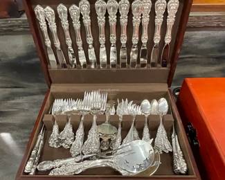 One of 3 sets of sterling flatware