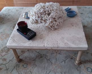 Faux coquina coffee table with large coral