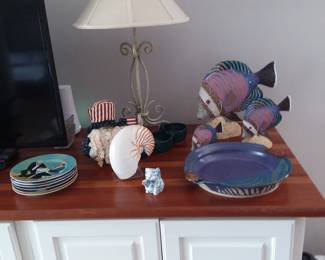 Fun fishes! Uncle Sam! Pottery, kitty creamer, plates, and nice shell.