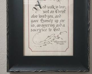 Framed scripture quote.