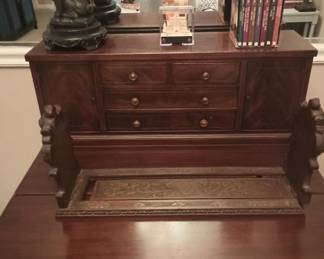 Small, pretty antique desk, which folds down to make larger, and up to make smaller. Drawers and little cubbies.