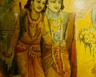 Large antique egg with a painting depicting Radha and Krishna, a central divine couple in Hinduism, symbolizing divine love and devotion