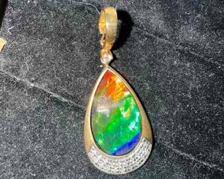 18K faceted ammolite pendant with diamond accents