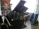 BABY GRAND PIANO WITH MUSIC PLAYER.