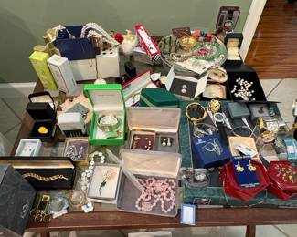 Assorted jewelry and perfumes