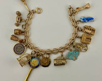 14K gold charm bracelet. Charms will be sold individually.