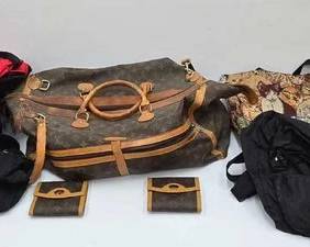 1902  9 Louis Vuitton Duffle Bags  Wallets 