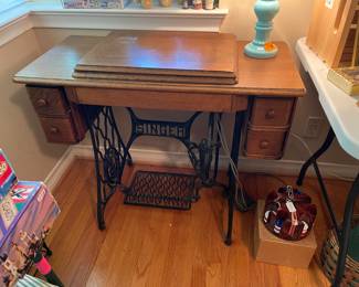 Antique sewing machine, which is all intact.