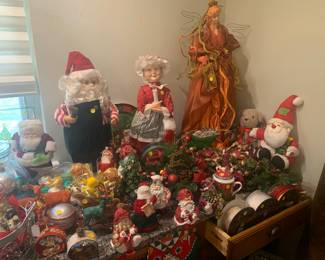 Lots of Santas and Mrs. Claus, holiday ribbons