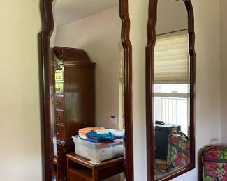 Two decorative cherry mirrors with beveled edges