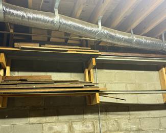 Wood in Basement on top shelf. We have a short step ladder for you to get this down
