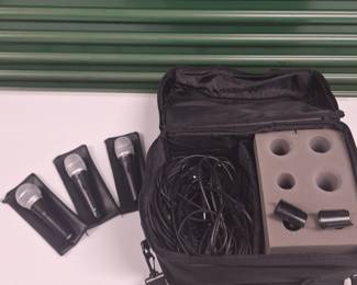 Shure microphones and carrying case.