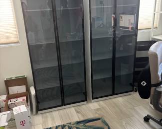 Bookcases light up with choice of colors.