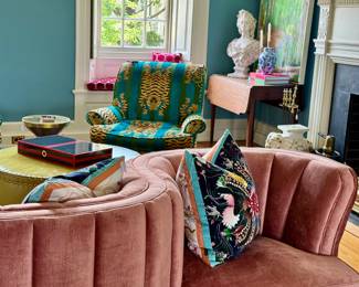 Christian Lacroix pillows, Anthropologie tete-a-tete, Lee Insdustries leather ottoman with nailhead trim, andthe best looking chairs on earth!