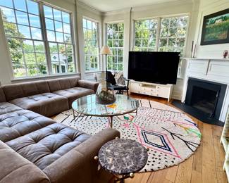 Burano Leather Sectional Sofa, Visual Comfort floor Lamp, 10" round Moroccan Rug, Anthrolopogie Merriton Media Console, Anthropologie Bird side table, Parclay Black Leather chair