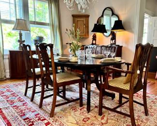 Simply - but stunning- dining table with extra leaf, set of 8 antique dining chairs, antique rug, MCM side table, antique pine corner cabinet, Waterford stemware