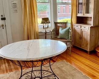 Superb antique pine cabinet, caned chair, vintage hand painted floor lamp, and this rug...so beautiful