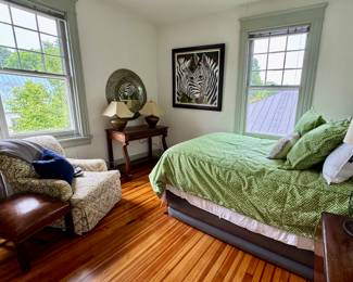Club chair, leather footstools, benches, antique sideboard, asian themed brass lamps...