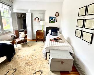 , simply the most divine rug you will ever see, old trunks, leather chairs, folk art and more