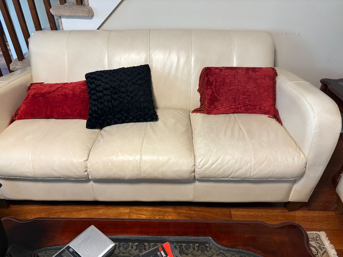 white leather couch and lover seat