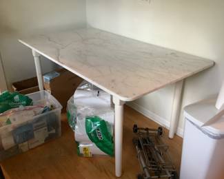 White table with marble top