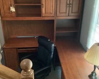Large office desk…has upper cabinets for storage, a desk with pull out for keyboard and a side credenza for working.  Has two drawer file cabinet under credenza.  Presale $150