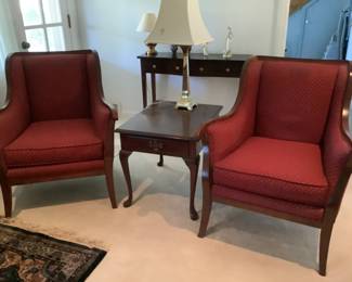 Pair of dark red chairs trimmed in wood.  Each $125 or pair for $200.   No smoking or pets.