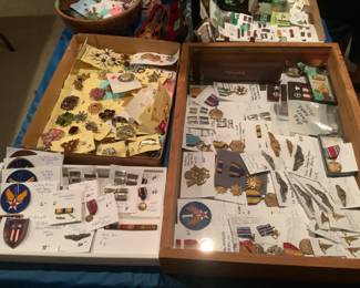 Vietnam and WWII service medals.  Rank was captain and major.  Pilot status.  