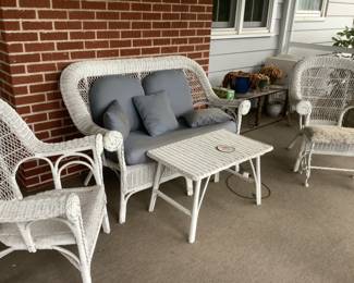 This wicker set includes the loveseat, two chairs and table.  Presale $200.
