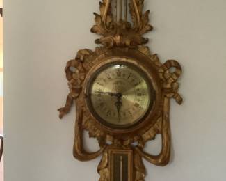 This is such a unique clock and barometer.  Detailed and quite old.