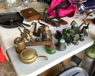 Cast iron items, plus two fry pan, and banks