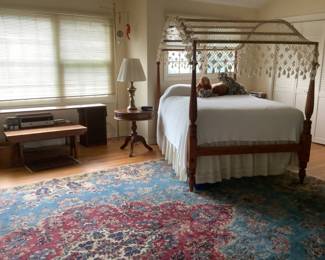 This four poster canopy bed measures 54” w x 82” l x 75 h.  Includes mattress and box spring.  Presale $250