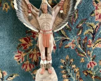 Carved Indian statue.  Signed