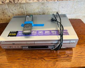 Blue tape keeps the remote from making a break from years of captivity.  