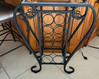 Wine rack with drinking table built in.  Genius idea.