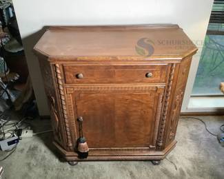 Vintage Wooden Cabinet with Decorative Carvings