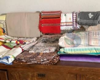 Assorted Textile Collection with Tablecloths, Towels, and Blankets