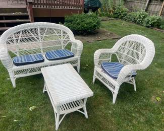 White Wicker Patio Set, kept indoors. Also includes a side table