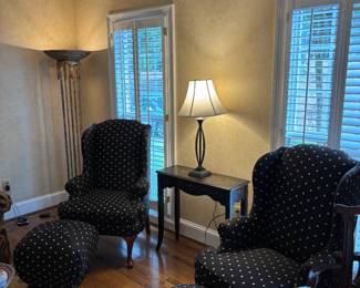 Pair of accent chairs with footstools 